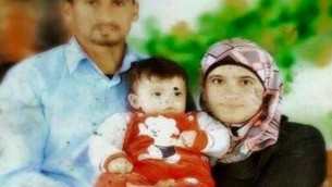 سعد ورهام دوابشة، مع طفلهما علي (لقطة شاشة: القناة 2) 