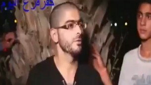 نشأت ملحم يظهر في برنامج مسابقات تلفزيوني خلال شهر رمضان في صور تم الكشف عنها لمنفذ هجوم إطلاق النار في تل أبيب، يناير 2016. (لقطة شاشة: القناة 2) 