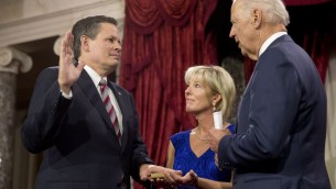 VP Joe Biden administers the Senate oath to Sen. Steve Daines R-Mont., with wife Cindy Daines, during a swearing-in ceremony, Tuesday, Jan. 6, 2015, in the Old Senate Chamber of Capitol Hill in Washington. Jacquelyn Martin/AP