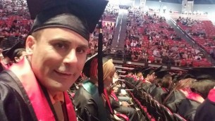 Robin Shahini during his May 2016 International Security and Conflict Resolution San Diego State University graduation ceremony. Shahini Family Photo via AP