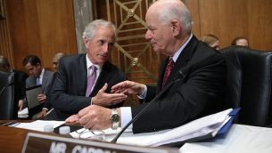 Cardin-Corker-handshake-e1431482011854-640x400