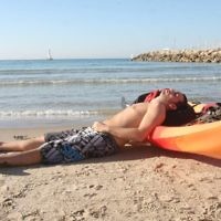 Just like summer … the scene on Tel Aviv’s beach on January 10 as Israelis enjoy an unseasonal heat wave. Photo: Isranet.