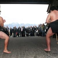 QUEENSTOWN, NEW ZEALAND. Photographer Ingrid Shakenovsky comments: When a group of tourists arrived at the New Zealand hotel, they were greeted by Maori dancers. To get both the dancers and the faces of the guests in the photo, go behind the dancers for the best result.