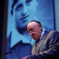 Yom Hashoa Commoration 2010. Robert Blackwood Hall. Holocaust survivor Jack Unikowski lights one of the six memorial candles. Photo: Peter Haskin