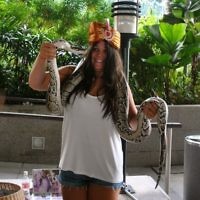Shirley Casper of Cremorne, NSW entered this photo of Annie Casper with a python in Singapore in January 2011. Shirley Casper of Cremorne, NSW entered this photo of Annie Casper with a python in Singapore in January 2011.