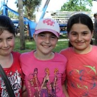 Chanukah in the Park 2010. From left: Amy Gilbert, Aviva Jacobs, Angelina Atanaffova. Photo: Peter Haskin