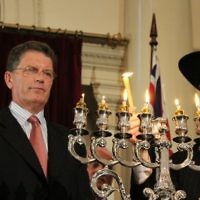 Chanukah at Queens Hall, Parliament House  Victoria. Rabbi Chaim Herzog from Chabad CBD lights the menorah with newly elected Victorian Premier Ted Baillieu. Photo: Lochlan Tangas
