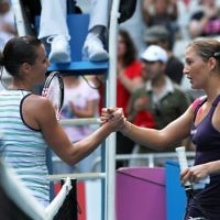 Australian Open 2011. Womens third round. Israel's Shahar Peer (right) congratulates Flavia Pennetta after losing in 3 sets to the Italian. Photo: Peter Haskin