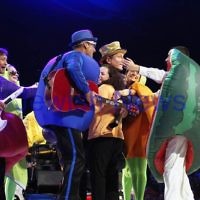 2-12-11. The Wiggles. Tammy Cohen on stage with the Wiggles at the Flemington racecourse in Melbourne singing "Fruit Salad". Tammy won a competition to be the 5th Wiggle. Photo: Peter Haskin