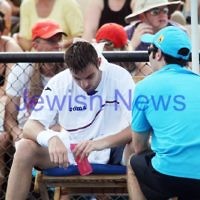 17-1-12. Australian Open 2012. Mens Round 1. Jesse Levine v Marcel Granollers. Granollers taking a heat time out. Photo: Peter Haskin 17-1-12. Australian Open 2012. Mens Round 1. Jesse Levine v Marcel Granollers. Granollers taking a heat time out. Photo: Peter Haskin