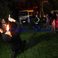 9-5-12. Lag B'omer 2012. Fire juggler at Katanga. Photo: Peter Haskin