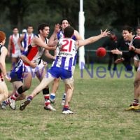 AJAX v Oakleigh. 26-5-12.  Corey Janke firing off a handball. Photo: Peter Haskin