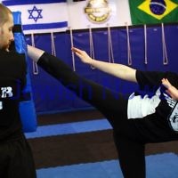 11-6-12. Krav Maga instructor Melinda Slonim warming up before taking a women's session. Photo: Peter Haskin