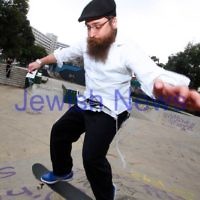 6-6-12. Rabbi and avid skate boader Dovid Tsap taking time out to practice a few moves at the Prahran skate park in Melbourne. Photo: Peter Haskin 6-6-12. Rabbi and avid skate boader Dovid Tsap taking time out to practice a few moves at the Prahran skate park in Melbourne. Photo: Peter Haskin
