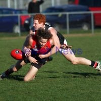 21-7-12. AJAX v Old Brighton at Brighton Beach Oval.  Josh Ludski applies a tackle. Photo: Peter Haskin