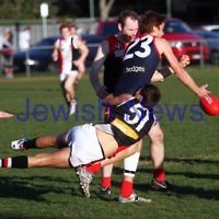 21-7-12. AJAX v Old Brighton at Brighton Beach Oval.  Jason Samuel lays a tackle. Photo: Peter Haskin