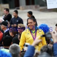 22-8-12. A packed Federation Square in Melbourne welcomes home Australia's medalists from the London 2012 Olympics.  Liz Canbage. Photo: Peter Haskin
