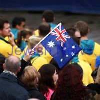 22-8-12. A packed Federation Square in Melbourne welcomes home Australia's medalists from the London 2012 Olympics.  Australian flag. Photo: Peter Haskin