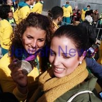 22-8-12. A packed Federation Square in Melbourne welcomes home Australia's medalists from the London 2012 Olympics. Jewish silver medalist Jessica Fox having her photo taken with a fan. Photo: Peter Haskin