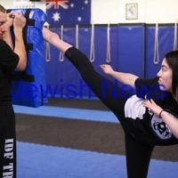 11-6-12. Krav Maga instructor Melinda Slonim warming up before taking a women's session. Photo: Peter Haskin 11-6-12. Krav Maga instructor Melinda Slonim warming up before taking a women's session. Photo: Peter Haskin