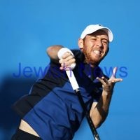 Australian Open 2013. Round 1. JDudi Sela (ISR) lost to Nikolay Davydenko (RUS) 6-3 1-6 5-7 3-6. Photo: Peter Haskin