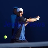 Australian Open 2013. Round 1. JDudi Sela (ISR) lost to Nikolay Davydenko (RUS) 6-3 1-6 5-7 3-6. Photo: Peter Haskin