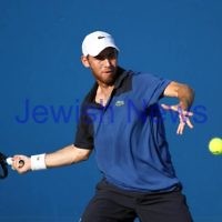 Australian Open 2013. Round 1. JDudi Sela (ISR) lost to Nikolay Davydenko (RUS) 6-3 1-6 5-7 3-6. Photo: Peter Haskin