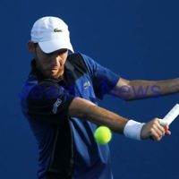 Australian Open 2013. Round 1. JDudi Sela (ISR) lost to Nikolay Davydenko (RUS) 6-3 1-6 5-7 3-6. Photo: Peter Haskin