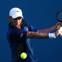 Australian Open 2013. Round 1. JDudi Sela (ISR) lost to Nikolay Davydenko (RUS) 6-3 1-6 5-7 3-6. Photo: Peter Haskin