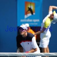 Australian Open 2013. Round 1, Mens Doubles.  Jonathan Erlich (ISR) / Kevin Anderson (RSA) def 2nd seeds Leander Paes (IND) / Radek Spepanik (CZE)  6-3 7-5.  Photo: Peter Haskin