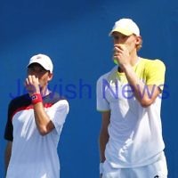 Australian Open 2013. Round 1, Mens Doubles.  Jonathan Erlich (ISR) / Kevin Anderson (RSA) def 2nd seeds Leander Paes (IND) / Radek Spepanik (CZE)  6-3 7-5.  Photo: Peter Haskin