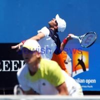 Australian Open 2013. Round 2, Mens Doubles.  Jonathan Erlich (ISR) / Kevin Anderson (RSA) def Matthew barton (AUS / John Millman (AUS) 6-1 6-7 6-3 Photo: Peter Haskin