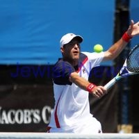 Australian Open 2013. Round 2, Mens Doubles.  Jonathan Erlich (ISR) / Kevin Anderson (RSA) def Matthew barton (AUS / John Millman (AUS) 6-1 6-7 6-3 Photo: Peter Haskin