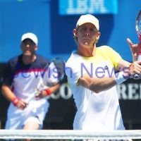 Australian Open 2013. Round 2, Mens Doubles.  Jonathan Erlich (ISR) / Kevin Anderson (RSA) def Matthew barton (AUS / John Millman (AUS) 6-1 6-7 6-3 Photo: Peter Haskin