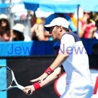 Australian Open 2013. Round 2, Mens Doubles.  Jonathan Erlich (ISR) / Kevin Anderson (RSA) def Matthew barton (AUS / John Millman (AUS) 6-1 6-7 6-3 Photo: Peter Haskin