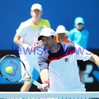 Australian Open 2013. Round 2, Mens Doubles.  Jonathan Erlich (ISR) / Kevin Anderson (RSA) def Matthew barton (AUS / John Millman (AUS) 6-1 6-7 6-3 Photo: Peter Haskin