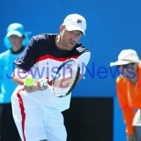 Australian Open 2013. Round 2, Mens Doubles.  Jonathan Erlich (ISR) / Kevin Anderson (RSA) def Matthew barton (AUS / John Millman (AUS) 6-1 6-7 6-3 Photo: Peter Haskin