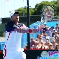 Australian Open 2013. Round 2, Mens Doubles.  Jonathan Erlich (ISR) / Kevin Anderson (RSA) def Matthew barton (AUS / John Millman (AUS) 6-1 6-7 6-3 Photo: Peter Haskin