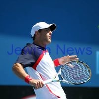 Australian Open 2013. Round 2, Mens Doubles.  Jonathan Erlich (ISR) / Kevin Anderson (RSA) def Matthew barton (AUS / John Millman (AUS) 6-1 6-7 6-3 Photo: Peter Haskin
