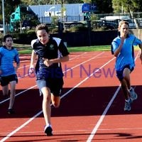 jnr carnival 2013. Noa Shenker (VIC)  winning the 200m. Sydney. photo: Henry benjamin.