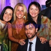 6-3-13. UIA Gala Dinner. Peninsula, Docklands. Paralympic tennis gold medalist Noam Gershony with some of his fans. Photo: Peter Haskin