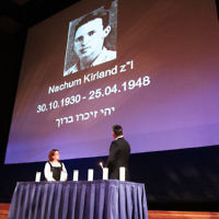 14-4-13. Yom Ha Zikaron at Robert Blackwood Hall, Monash University. Nachum Levi ights a candle for his cousin Nachum Kirland. Photo: Peter Haskin