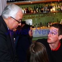 7-9-13. Election day 2013. Member for Melbourne Ports, Michael Danby talks with one of his supporters on election night while waiting for results. Photo: Peter Haskin