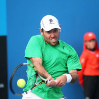 14-1-14. Australian Open 2014. Mens Singles Round 1. Wayne Odesnik (USA) lost to Vincent Millot (FRA) 7-5 4-6 6-7(4) 6-1 6-3 . Photo: Peter Haskin 14-1-14. Australian Open 2014. Mens Singles Round 1. Wayne Odesnik (USA) lost to Vincent Millot (FRA) 7-5 4-6 6-7(4) 6-1 6-3 . Photo: Peter Haskin