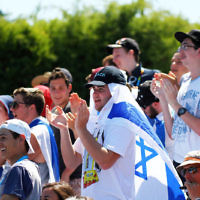13-1-14. Australian Open. Round 1. Day 1. Dudi Sela (ISR) lost to Jarkko Niemimen (FIN) 6-3 6-7 7-6 6-3 6-3. Sela supporters in the crowd. Photo: Peter Haskin