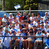 13-1-14. Australian Open. Round 1. Day 1. Dudi Sela (ISR) lost to Jarkko Niemimen (FIN) 6-3 6-7 7-6 6-3 6-3. Sela supporters in the crowd. Photo: Peter Haskin