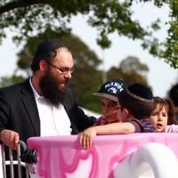 1-12-13.  Chanukah in the Park  2013 at Melbourne's Caulfield Park. Enjoying the spinning cup ride. Photo: Peter Haskin