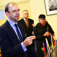 5-12-13. Last day of Chanukah. East Melbourne Hebrew Congregation. Rabbi David Gutnick, Jewish Chaplain with the Australian Defense Force, organised a candle lighting ceremony incorporating members of the ADF and guests that included Felix and Yvonne Sher, parents of Private Greg Sher who was killed in Afganistran. Rabbi Ralph Genende. Photo: Peter Haskin 5-12-13. Last day of Chanukah. East Melbourne Hebrew Congregation. Rabbi David Gutnick, Jewish Chaplain with the Australian Defense Force, organised a candle lighting ceremony incorporating members of the ADF and guests that included Felix and Yvonne Sher, parents of Private Greg Sher who was killed in Afganistran. Rabbi Ralph Genende. Photo: Peter Haskin