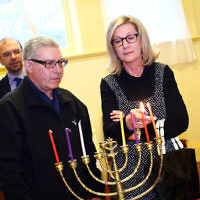 5-12-13. Last day of Chanukah. East Melbourne Hebrew Congregation. Rabbi David Gutnick, Jewish Chaplain with the Australian Defense Force, organised a candle lighting ceremony incorporating members of the ADF and guests that included Felix and Yvonne Sher, parents of Private Greg Sher who was killed in Afganistran. Photo: Peter Haskin 5-12-13. Last day of Chanukah. East Melbourne Hebrew Congregation. Rabbi David Gutnick, Jewish Chaplain with the Australian Defense Force, organised a candle lighting ceremony incorporating members of the ADF and guests that included Felix and Yvonne Sher, parents of Private Greg Sher who was killed in Afganistran. Photo: Peter Haskin