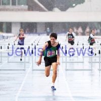 16-2-14. Victorian Junior Athletics Championships. Lakeside Stadium. A very wet start to the sunday events. Men U 14 90m hurdles. Photo: Peter Haskin 16-2-14. Victorian Junior Athletics Championships. Lakeside Stadium. A very wet start to the sunday events. Men U 14 90m hurdles. Photo: Peter Haskin